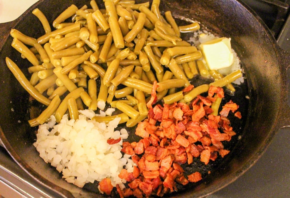 green beans bacon, butter, onion in a skillet