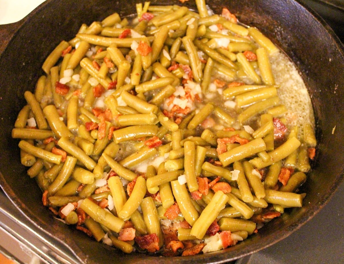 green beans bacon, butter, onion in a skillet