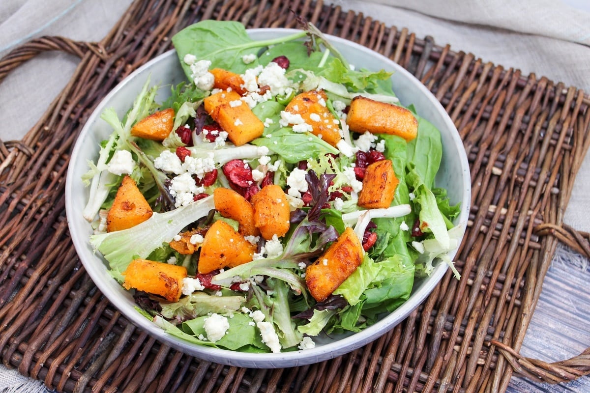 salad with squash, blue cheese, and cranberries