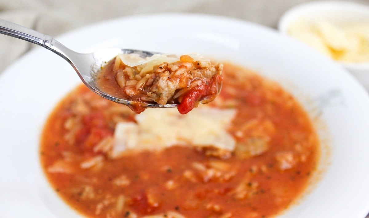 orzo soup on a spoon