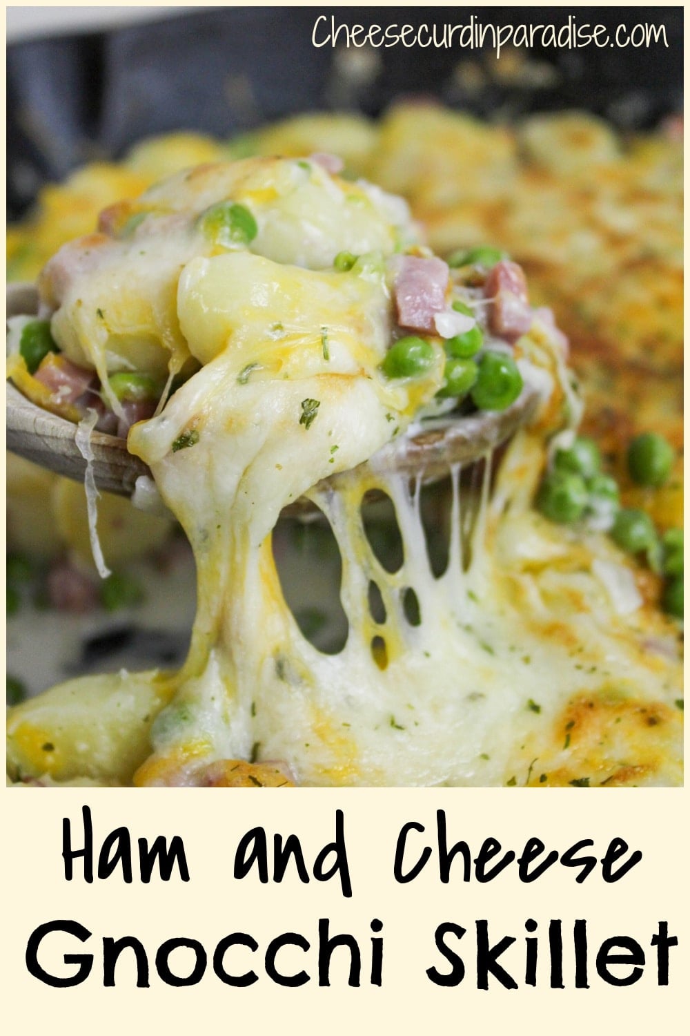 ham and cheese gnocchi skillet scooped on a spoon