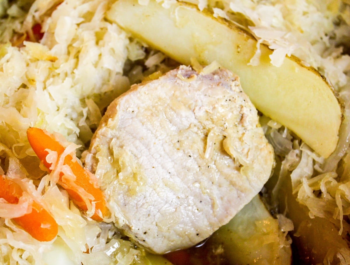 close up photo of pork chop in the pot