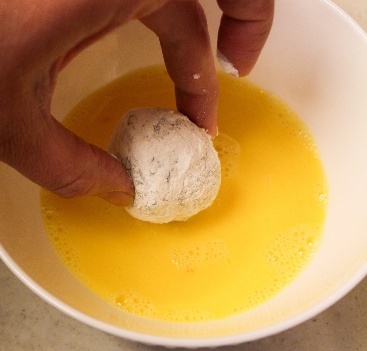 bite dipped in egg
