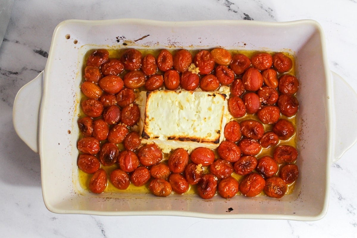 cooked tomatoes and feta