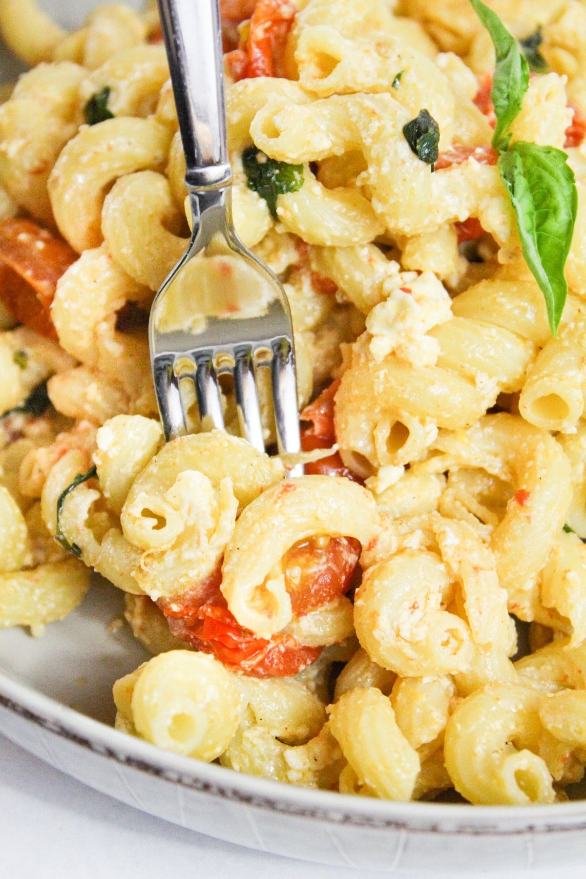 baked feta pasta on a fork