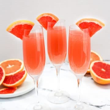 rose mimosas garnished with grapefruit slices