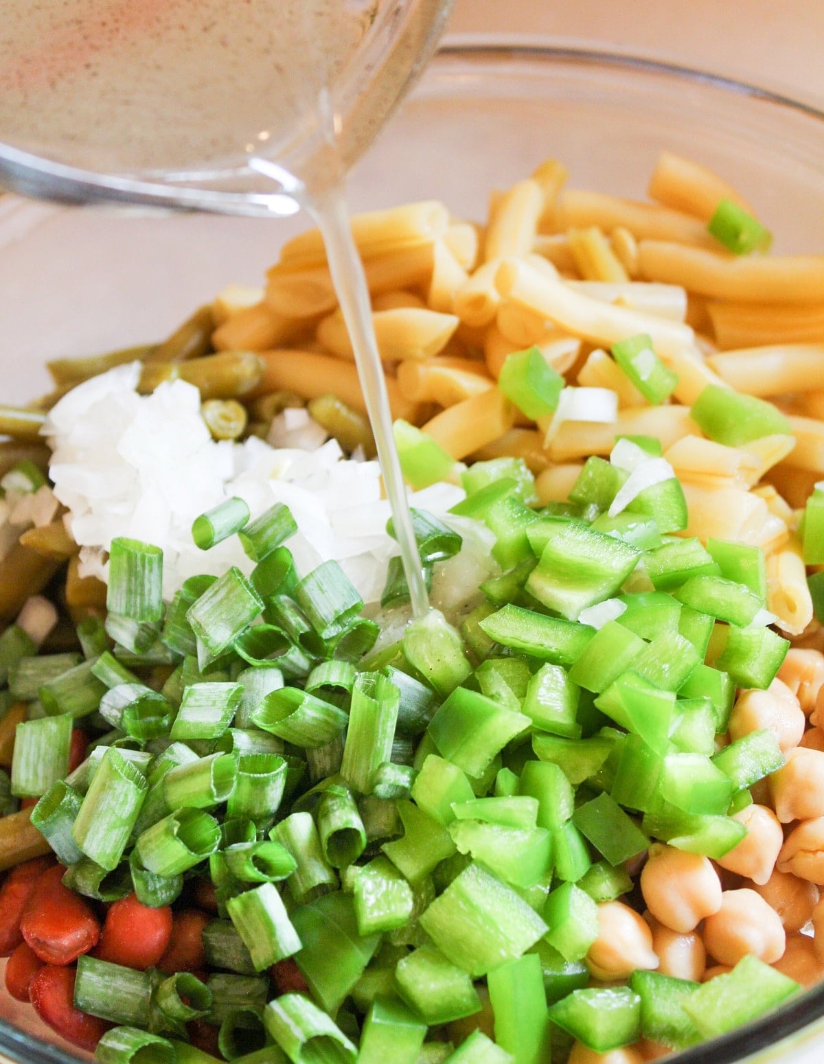 dressing poured over 3-bean salad