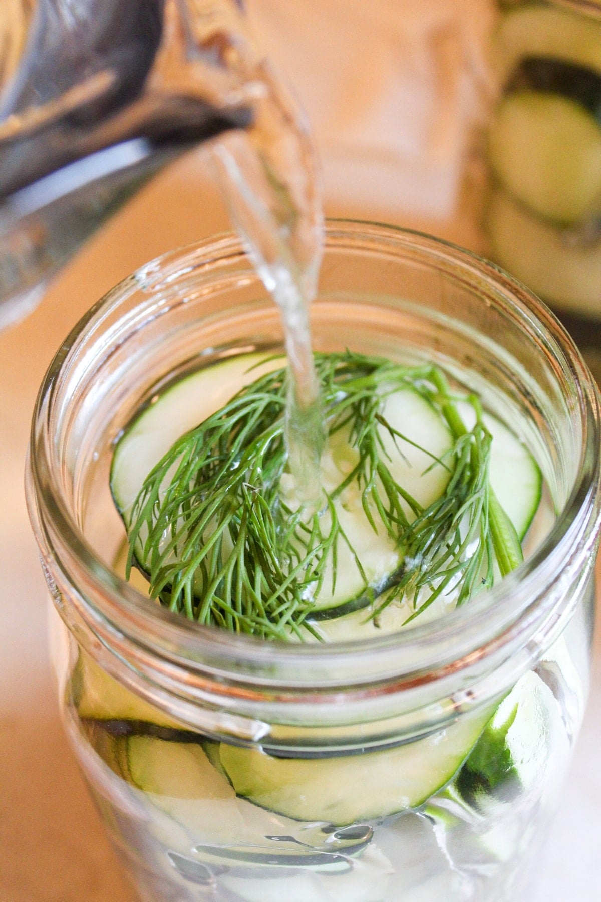 pickling liquid poured into jar