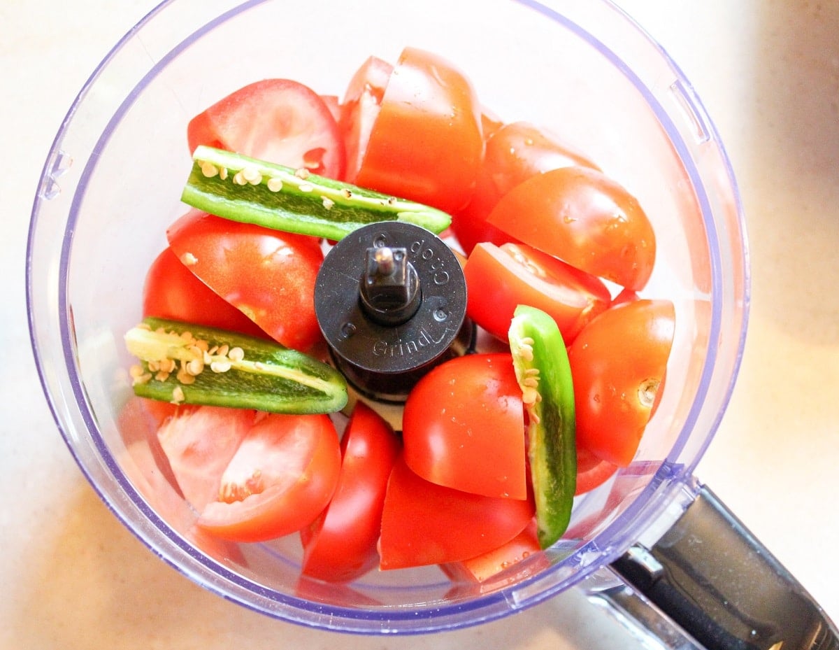 tomatoes and pepper in a food processor