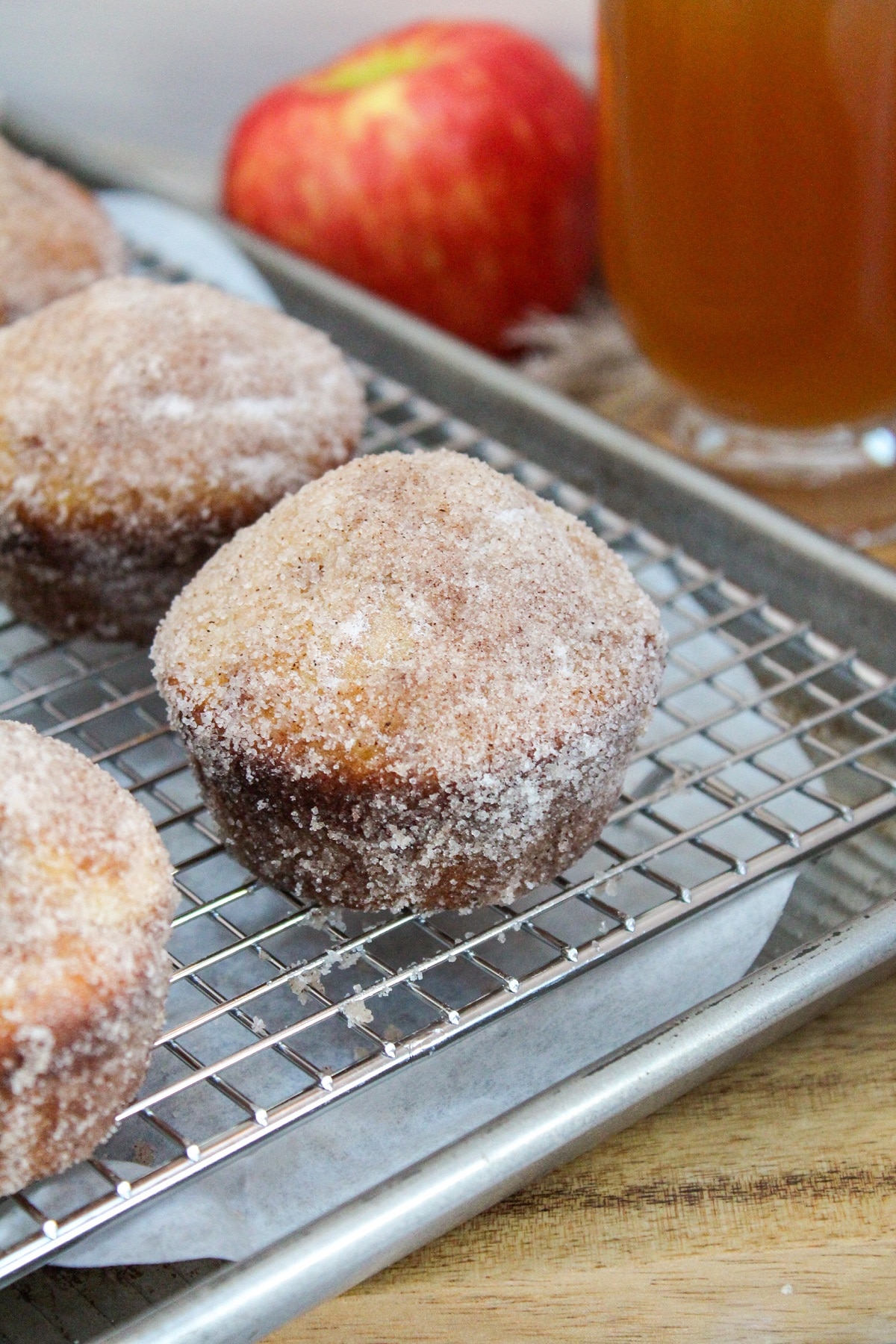 apple cider doughnuts muffins on cooling rack