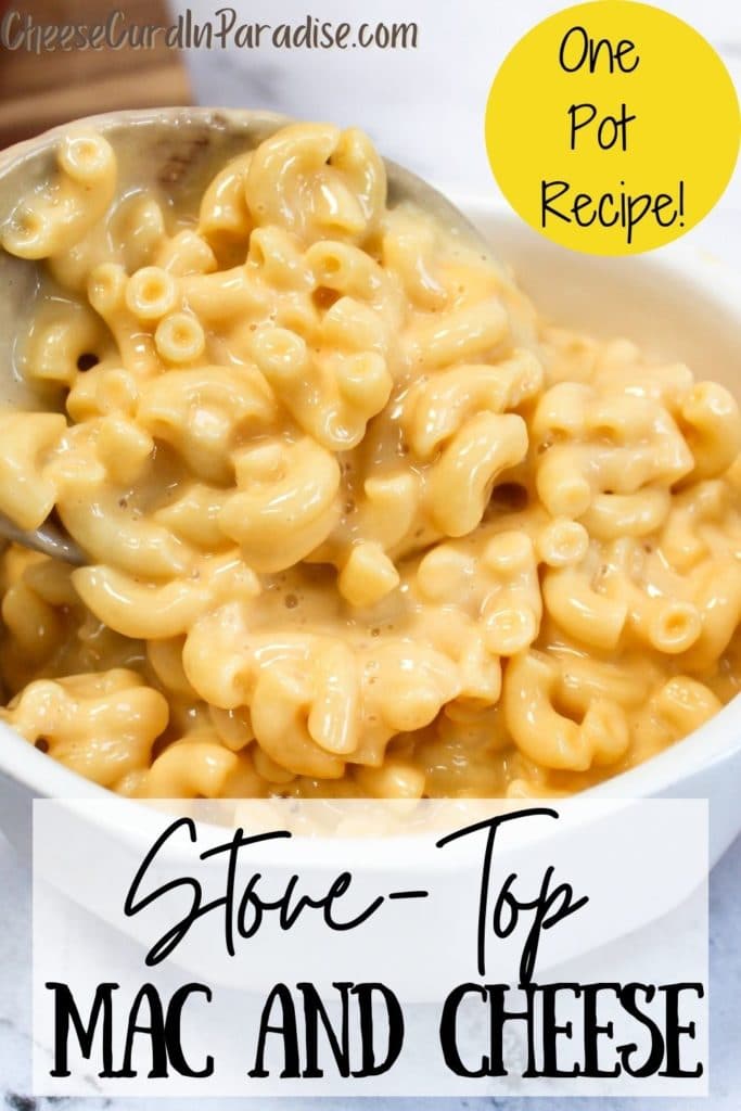 one-pot stove top mac and cheese put into a white bowl from a wooden spoon