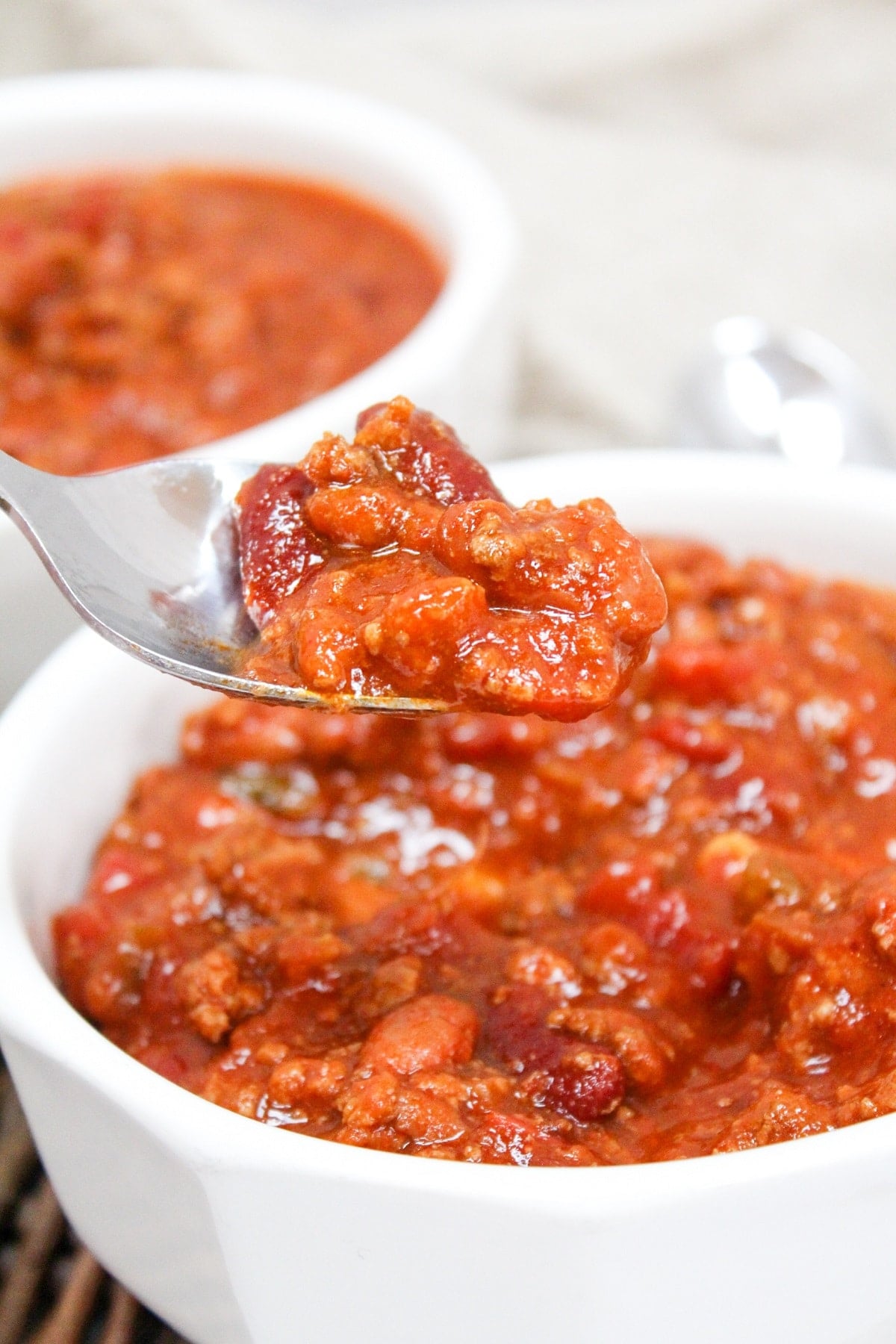 venison chili on a spoon