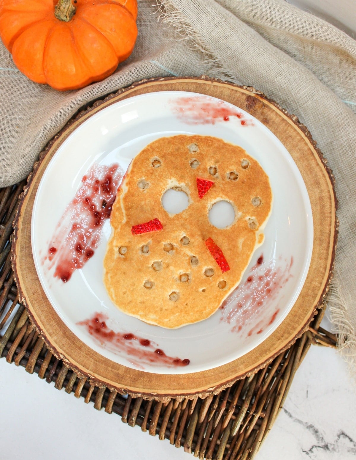 jason vorhees, friday the 13th, ski mask pancake on a plate with raspberry jam on the plate
