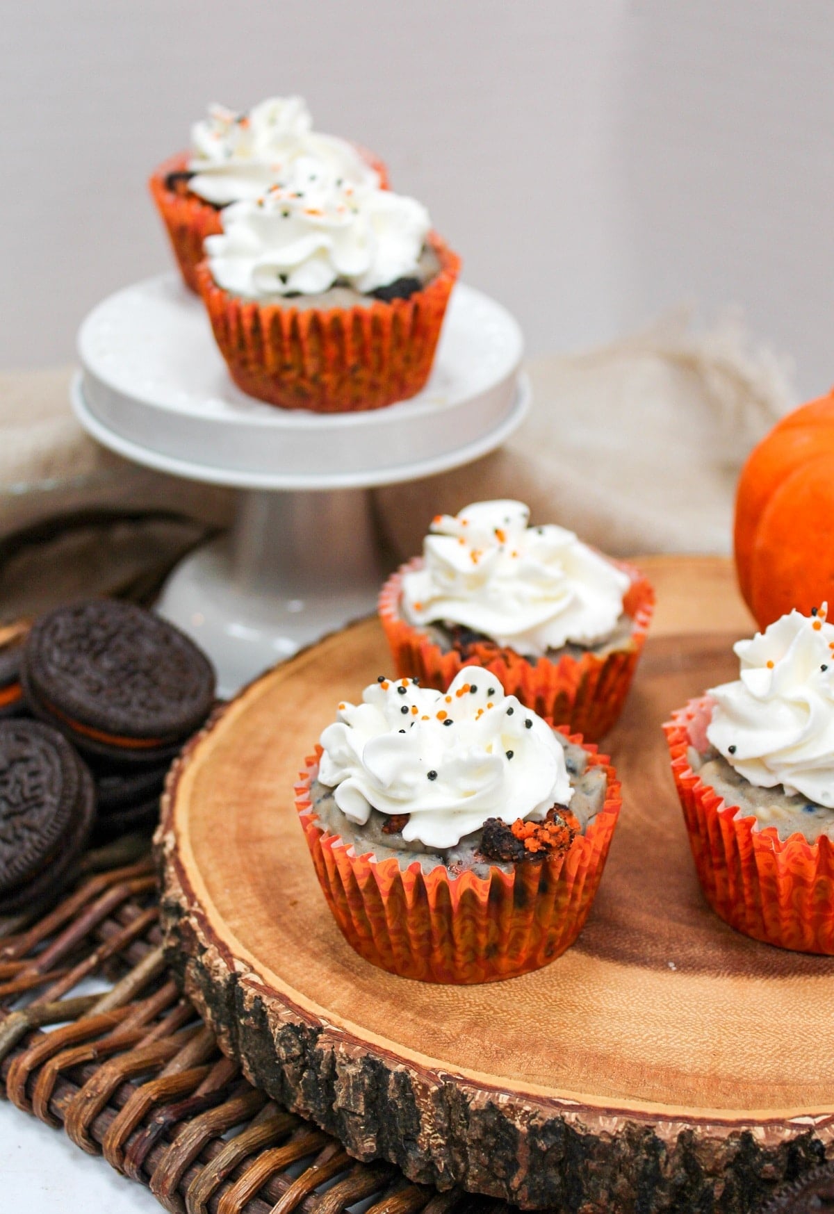 Mini Halloween Oreo Cheesecakes in orange wrappers