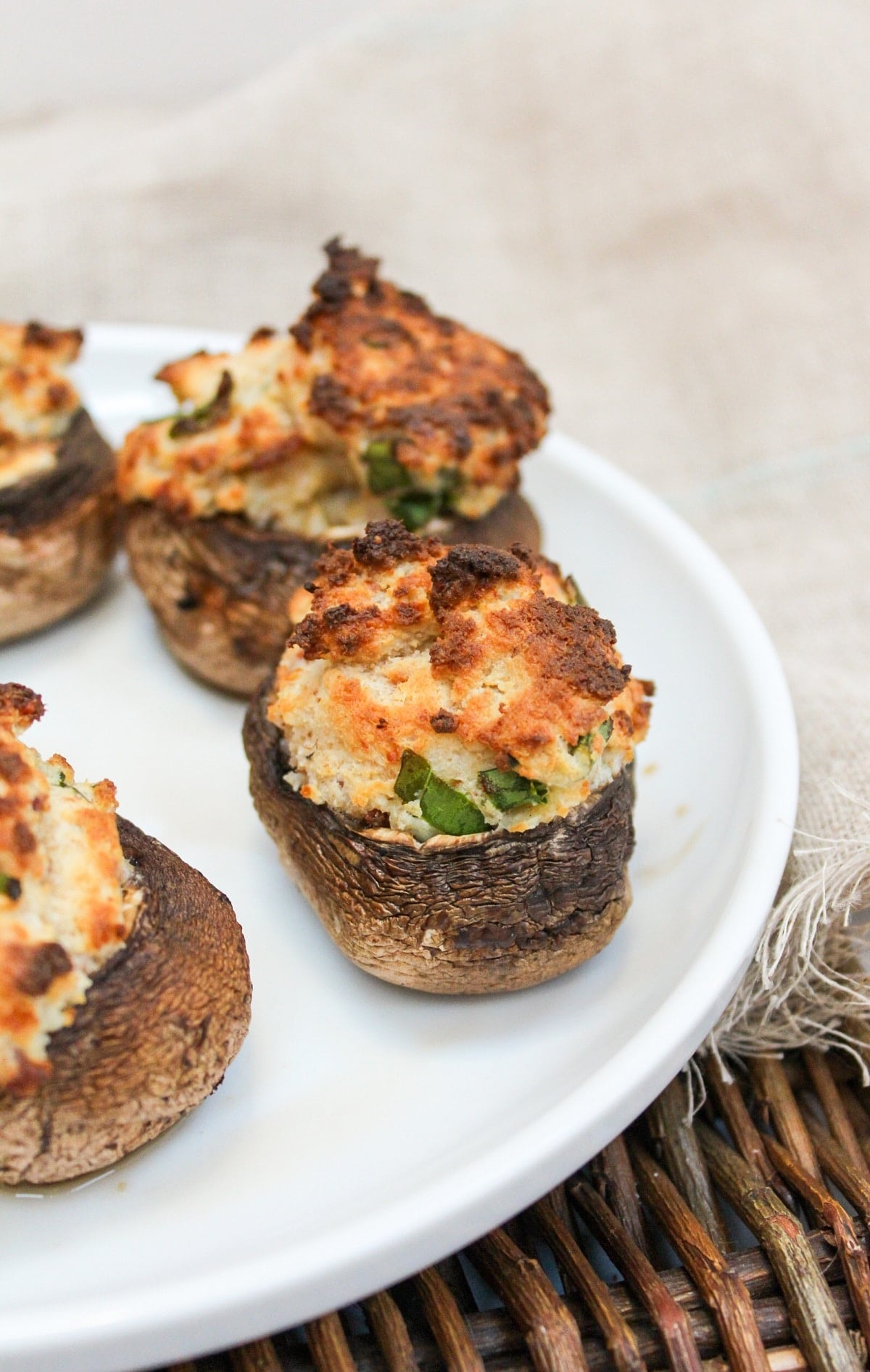 air fryer stuffed mushroom on a white plate