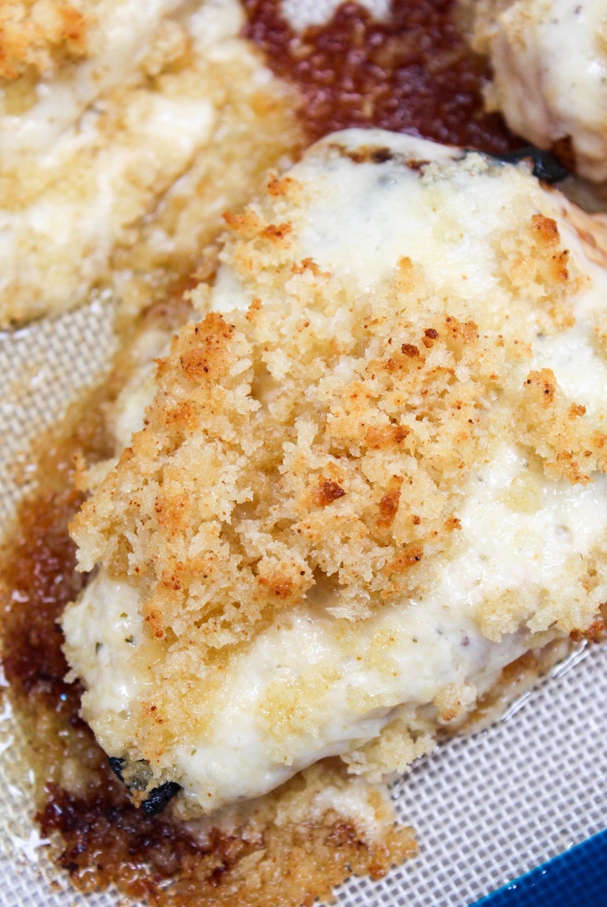 Longhorn Steakhouse Parmesan Chicken on a sheet pan