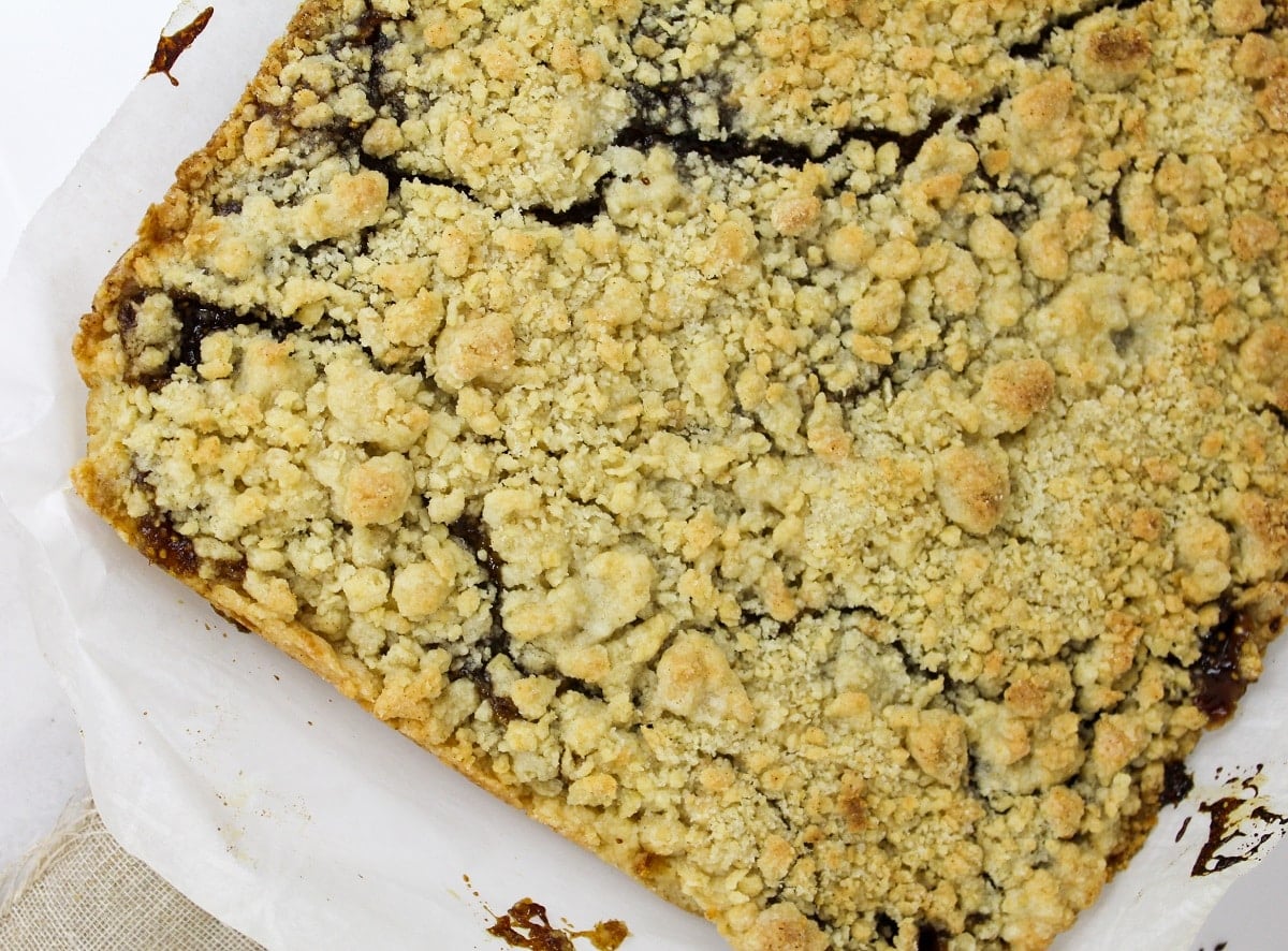Overhead photo of uncut dessert bars with crumble topping.